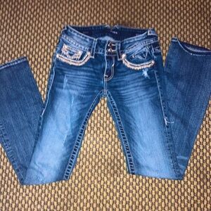 Vigoss brand women’s jeans 25 waist 33 length style is “The Dublin”.